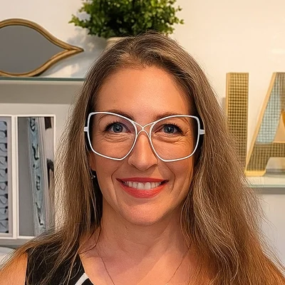 A headshot photo of Andrea, the practice manager at Northern Avenue Eye Care