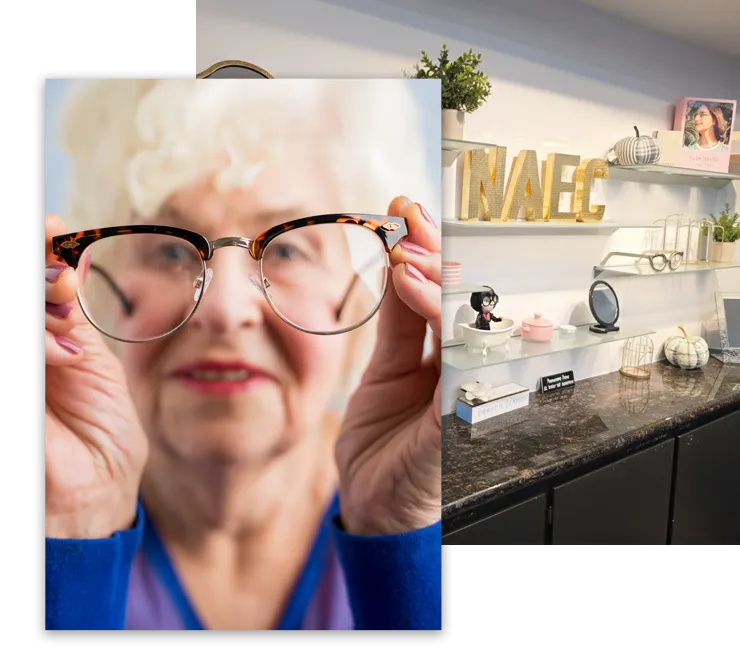 A woman holding her eyeglasses in front of her face